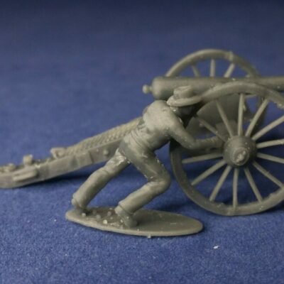 Confederate canoneer in hat moving cannon for right wheel